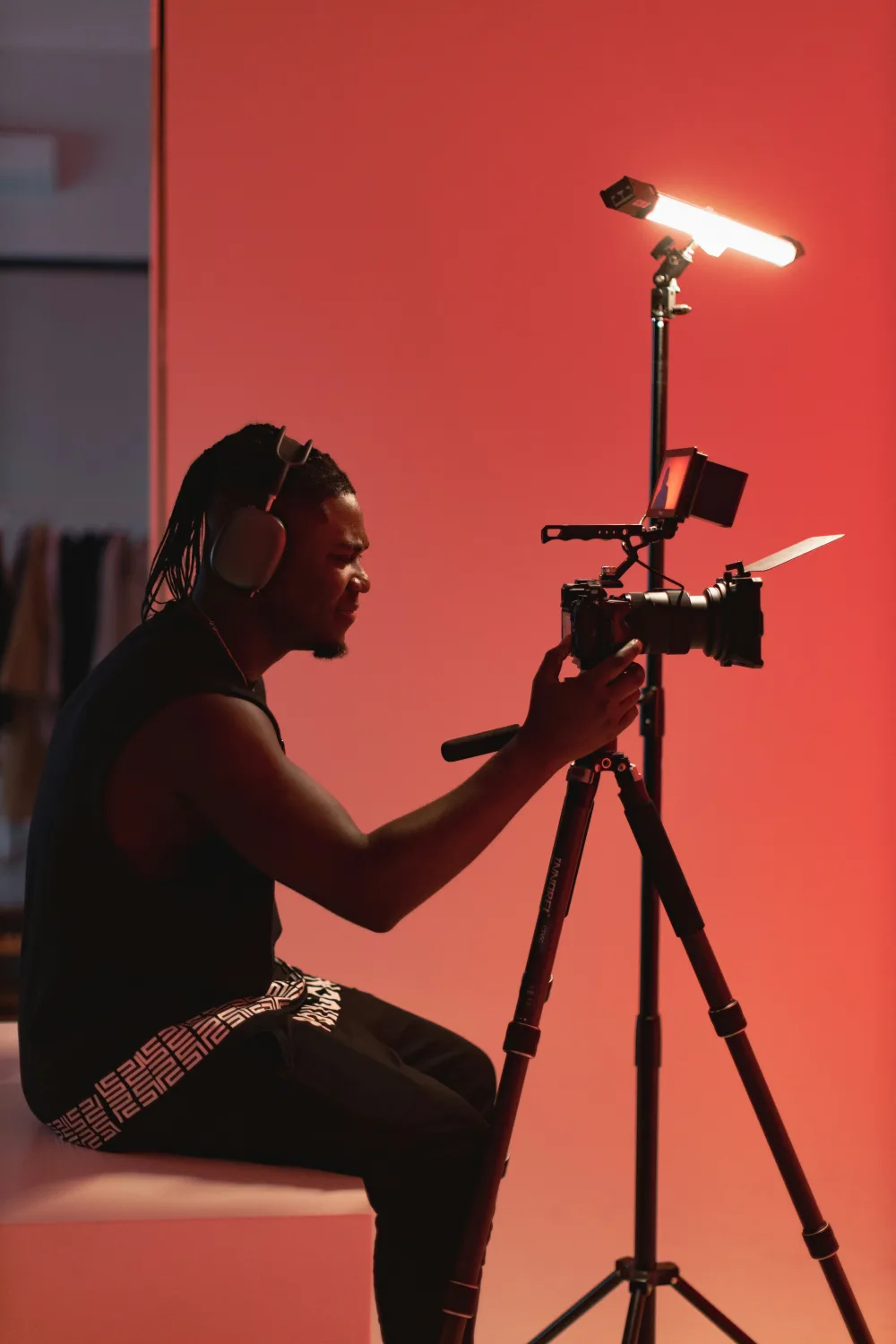 A creator filming in a studio